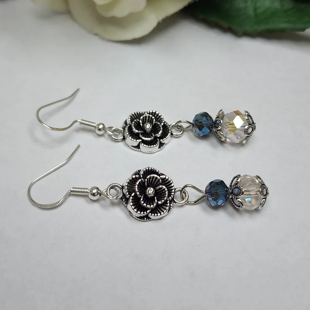 Hand Crafted Dangle Earrings With AB Crystals And Silver Toned Flowers - Picture 4 of 7